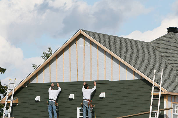 Professional Siding Contractor technician working in Wycombe, PA